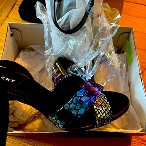 DKNY women’s heel. 9.5 runs a little small. Never before worn